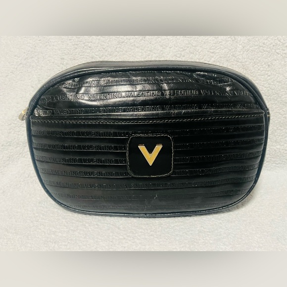 Mario Valentino Handbags - Mario Valentino Monogram Black Clutch
